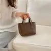 Bolso de Moda y Tendencia Tipo Cubo para Mujer 2026 Nuevo Elegante Versátil Bolso Cruzado con un Toque de Lujo para Salidas