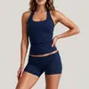 Conjunto de fitness europeu e americano transfronteiriço, conjunto de duas peças com top sem mangas de gola halter cor sólida e shorts justos, conjunto de roupa esportiva para corrida e yoga feminino