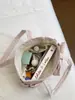 Diseño de nicho coreano estilo ins bolsa nube de moda simple personalidad diaria rayas verticales bolsa tote para mujer de uso diario