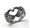 Anillo retro con gesto de amor transfronterizo, combinación de calavera y mano europea y americana, concéntrico y agresivo. Fabricantes.