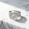 Anillo de plata esterlina de moda transfronteriza de comercio exterior Tong Lin, estilo europeo y americano, clásico anillo de circón de cuatro garras, combinación dos en uno