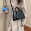 Bolso pequeño de diseño moderno para mujer, nueva colección 2026, bolso cruzado simple, bolso de mano moderno y casual, perfecto para el uso diario