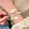 Pulseira de Concha e Búzios Estilo Resort à Beira-Mar, com Contas Empilhadas, Alto Valor Estético, Versátil, Joia Feminina Suave e Elegante