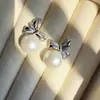 Pendientes de Lazo con Perlas y Aguja de Plata S999, Modernos y Versátiles, Diseño de Nicho, Gama Alta, Lujo Ligero, Pendientes Elegantes y Únicos