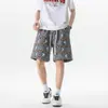 Shorts Florales Europeos y Americanos de Alta Resistencia para Hombre Verano 2025 Casual Playa Holgados Talla Grande Modernos Versátiles Bordados a la Rodilla
