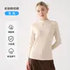 Nueva camiseta base de cuello alto versátil de corte ajustado para mujer, otoño e invierno 2026, top de manga larga de color liso ajustado