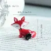 Bestseller transfronteiriço Jingdezhen cerâmica raposa rotativa desenho animado ornamento criativo vidro artesanato ornamento atacado