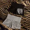 Shorts de moda Y2K con cintura ancha plegable y estampado de alas de ángel, ajustados y ceñidos a la cadera, tipo hot pants deportivos casuales para chica hot