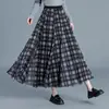 Falda de retazos a cuadros reversible para mujer, nueva falda de cintura alta con corte en A adelgazante para otoño/invierno 2026, falda elegante y versátil