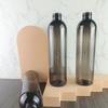 Ventas Directas de Fábrica 24 Dientes Botella Hombro Redondo 300ml Mascota Negra Transparente Set de Cuidado Hotel Botella de Loción Delgada