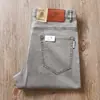 Pantalones casuales rectos holgados de cinco bolsillos para hombre, estilo estación europea de verano, finos, color azul grisáceo claro, lavado retro, cintura media-alta, microelásticos