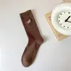 Calcetines mujer desodorantes absorbentes de sudor invierno con felpa ins modernos combinan con todo letra deportivos engrosados de buena apariencia calcetines de pareja