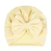 Chapéu de bebê europeu e americano transfronteiriço cor sólida chapéu de bebê indiano cordão com laço para recém-nascido chapéu pullover de veludo cotelê