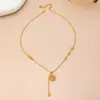 Loja de Ouro Mesmo Estilo Banhado a Ouro Cabacinha Bússola Oito Tesouros Pingente de Borla Novo Vintage Bússola da Fortuna Conjunto de Anel e Pulseira
