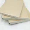 Cuaderno inglés A4 de piel de vaca pura de primera calidad con un diseño simple retro de cuatro líneas y tres cuadrículas, adecuado para tareas estudiantiles