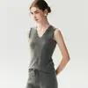 Novo colete de malha outono/inverno, gola V, cor sólida, sem mangas, com acabamento ondulado, versátil, slim fit e que valoriza a silhueta, em estilo francês, perfeito para o trabalho.