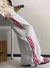Calça de moletom com três listras transfronteiriça para homens, estilo primavera e outono, marca americana retrô moderna, calça esportiva casual reta larga e solta