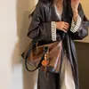 Bolsa de Hombro Individual de Gran Capacidad para Comercio Exterior para Mujer 2026 Nuevo Otoño Invierno Versátil Bolsa Tote Simple para el Trabajo Manual Cruzada