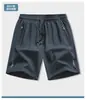 Mercadorias de Fujian shorts de seda gelada de secagem rápida masculinos de verão finos de comprimento médio calças de corrida casuais esportivas soltas de cinco pontos