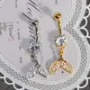 Nuevo colgante de ombligo estilo europeo y americano con forma de cola de pez, anillo de ombligo de titanio G23, joyería de ombligo chapada en oro real de 18k, directo del fabricante