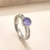 Anillo de Moda de Acero Inoxidable de Venta Caliente Transfronteriza Soldado Marca Incrustado con Anillo de Circonita Redonda Diseño de Nicho Femenino Fábrica de Joyería de Acero de Titanio