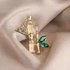 Novo broche estilo antigo de alta qualidade ins para mulheres estilo chinês leque borla pino de terno placket de pressão cheongsam corsage atacado