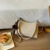 Nueva bolsa de hombro retro de nicho 2026 para mujer, linda y elegante, adecuada para el trabajo y los desplazamientos, bolsa de hombro de gran capacidad