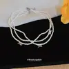Colar de pérolas com laço multicamadas estilo francês, moderno e versátil para o dia a dia, corrente para clavícula com toque de luxo leve e sofisticado para mulheres