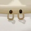 Brincos retrô, de luxo leve, de alta qualidade, versáteis, chiques, estilo nicho, pedra olho de tigre, para o dia a dia do trabalho, brincos da moda