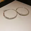 Pendientes Redondos de Diamante Cruzados de Aguja Plateada Lujo Ligero Pendientes de Gama Alta Personalidad Simple Moda Versátil Pendientes Venta al por Mayor
