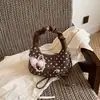 Bolso de mano de lunares transfronterizo para mujer, nuevo bolso de nube plisado de moda 2026, bolso cruzado de cadena simple y moderno