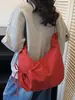 Bolsa de tela de nailon gran capacidad estilo nuevo 2026 diseño nicho para chicas plisada tipo empanada bandolera bolsa cruzada para ir al trabajo
