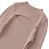Camiseta básica de cuello medio alto negra para mujer, nuevo estilo otoño 2026, suéter de punto interior sexy y elegante con diseño hueco de alta gama