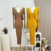 Vestido de punto ajustado con cuello halter y cárdigan a juego, conjunto de dos piezas para mujer para primavera y otoño