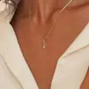 Europa y Estados Unidos venta transfronteriza exquisito collar personalizado de 26 letras moda mujer simple colgante de cobre joyería transfronteriza venta al por mayor