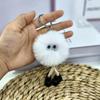 2023 Nuevo Llavero de Bola de Carbón con Piernas Largas Muñeco de Monstruo Pequeño Lindo Colgante para Mochila Muñeco de Imitación de Piel de Conejo Colgante