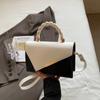 Bolso Cuadrado Pequeño Portátil de Metal Cruzado Simple Casual de Primavera con Combinación de Colores Texturizados de Moda Nuevo 2025 de Color en Contraste para Mujer