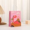 Nova bolsa de mão com estampa de dinossauro de desenho animado Sacola para embalagem de presente Dia das Crianças Sacola de embalagem portátil de papel Kraft atacado