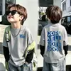 Ropa interior térmica cálida para niños, estilo patchwork de forro polar, otoño invierno 2026, nuevo, talla mediana y grande, cuello redondo, top moderno
