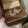 Pendientes de Plata de Ley S925 Flor de Plata Lisa Pendientes en Forma de C para Mujer Lujo Accesible Estilo de Nicho Versátiles Pendientes Nuevos de Gama Alta