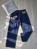 Comercio exterior Lazada Primavera/Otoño Hombres Estilo Americano Atractivo Versátil Pantalones de Pierna Ancha Bordado de Flor de Cerezo Pantalones de Mezclilla Lavados En Stock