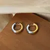 Pendientes redondos de dos colores de acero de titanio, estilo nuevo francés versátil de alta calidad, estilo simple y fresco, joyería de nicho para mujer