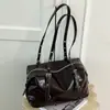 Nuevo bolso de mujer estilo coreano para principios de otoño de 2026, bolso de hombro o axila de moda nicho, bolso vintage