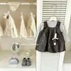 Saia de Couro LeEn babyRetro! Conjunto de Saia de Couro com Camiseta Regata de Bolinhas Nova para Meninas Outono 2026