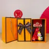 2025 Año de la Serpiente Tendencia Nacional Creativo Pequeña Serpiente de la Suerte Llavero Caja de Regalo Lindo Bolso Llavero Colgante Venta al por Mayor Pequeños Regalos