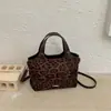 Bolsa de cubo de moda retro de alta gama 2026 transfronteriza, bolso de mano versátil casual, bolso de hombro, bolso cruzado