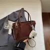 Bolsas de ombro de alta qualidade de nicho para mulheres 2026 nova versão coreana elegante bolsa de ombro bolsa de mão simples super quente bolsa de balde