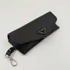Venta al por mayor de Estuches Nuevos de Gama Alta Pujia para Gafas en Stock, Estuche Suave de Cuero Negro Caja para Gafas de Sol, Caja de Empaque para Gafas de Sol