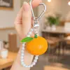Diseño fresco y elegante, llavero de manzana realista, cadena creativa de frutas de resina y perlas, pequeño colgante para el Día del Maestro