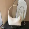 Bolsa Retro de Axila Feminina 2026 Novo Estilo Fashionável Chique Bolsa de Ombro Único Transversal Bolsa de Bolinho de Alto Valor Bolsa de Mão